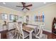 Dining room featuring a wooden table set for six and elegant coastal decor at 504 Sea Vista Ln., North Myrtle Beach, SC 29582