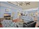 Cozy living room with hardwood floors, comfortable seating, a television, and an open floor plan at 504 Sea Vista Ln., North Myrtle Beach, SC 29582