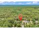 Aerial view of a home site within a dense forest setting at 5114 Cowart Ct., Murrells Inlet, SC 29576