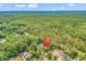 Aerial view of a home site within a dense forest setting at 5114 Cowart Ct., Murrells Inlet, SC 29576