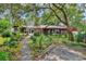Charming single-story home with a brick facade and vibrant landscaping, offering great curb appeal at 5114 Cowart Ct., Murrells Inlet, SC 29576