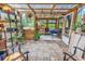 Bright sunroom featuring seating, plants, and natural light at 5114 Cowart Ct., Murrells Inlet, SC 29576