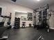 A fully equipped home gym provides a dedicated space for fitness and wellness with various equipment options at 5905 S Kings Hwy. # 206A, Myrtle Beach, SC 29575