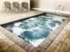 Enjoy relaxing in this square hot tub with a brick trim that is three feet deep at 5905 S Kings Hwy. # 206A, Myrtle Beach, SC 29575