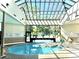 Indoor pool with glass ceiling and many large windows at 5905 S Kings Hwy. # 206A, Myrtle Beach, SC 29575