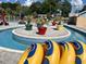 Close up of lazy river showing potted palm trees and tubes for riding at 5905 S Kings Hwy. # 206A, Myrtle Beach, SC 29575