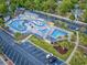 Aerial view of a neighborhood waterpark with lazy river, slides, picnic area and parking at 5905 S Kings Hwy. # 206A, Myrtle Beach, SC 29575