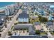 An aerial view of a coastal neighborhood with a building under construction near the beach at 5909 N Ocean Blvd. # 18, North Myrtle Beach, SC 29582