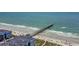 Beach scene featuring a long pier extending into the ocean at 5909 N Ocean Blvd. # 18, North Myrtle Beach, SC 29582