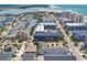 Aerial shot showing a blue-roofed condominium complex located in a neighborhood near the water at 5909 N Ocean Blvd. # 18, North Myrtle Beach, SC 29582
