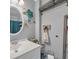 Bright bathroom featuring a sink, vanity, decor and wall-mounted towel rack at 5909 N Ocean Blvd. # 18, North Myrtle Beach, SC 29582
