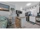 Cozy room with kitchen island, beach decor and a seating area at 5909 N Ocean Blvd. # 18, North Myrtle Beach, SC 29582