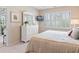 Inviting bedroom offering a bright window with plantation shutters and deck access at 601 Hillside Dr. N # 1931, North Myrtle Beach, SC 29582
