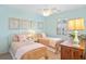 Charming bedroom with two twin beds, coastal decor, and bright natural light at 601 Hillside Dr. N # 1931, North Myrtle Beach, SC 29582