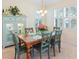 Cozy dining area featuring a wooden table, seating for six, and a decorative china cabinet at 601 Hillside Dr. N # 1931, North Myrtle Beach, SC 29582