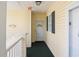 A welcoming entryway with an 'EXIT' sign, leading to a door numbered 1931 at 601 Hillside Dr. N # 1931, North Myrtle Beach, SC 29582
