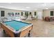 Recreation room with pool table, ping pong table, seating area, and exterior pool view at 601 Hillside Dr. N # 1931, North Myrtle Beach, SC 29582