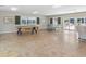 Community game room with pool table and ping pong table at 601 Hillside Dr. N # 1931, North Myrtle Beach, SC 29582
