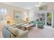 Comfortable living room with vaulted ceiling, neutral walls and sliding doors at 601 Hillside Dr. N # 1931, North Myrtle Beach, SC 29582