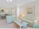 Spacious living area features plush sofas, side tables and view into the dining area at 601 Hillside Dr. N # 1931, North Myrtle Beach, SC 29582