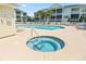 A view of the community pool and hot tub with lounge chairs and covered picnic area at 601 Hillside Dr. N # 1931, North Myrtle Beach, SC 29582