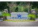 Well-maintained Ocean Keyes sign surrounded by beautiful landscaping at 601 Hillside Dr. N # 1931, North Myrtle Beach, SC 29582