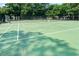 Outdoor tennis court surrounded by lush green trees at 601 Hillside Dr. N # 1931, North Myrtle Beach, SC 29582