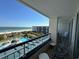 Relaxing balcony view overlooking the ocean and community pool area at 601 Retreat Beach Circle # 521, Pawleys Island, SC 29585