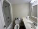 Bathroom features a sink with a marble countertop and a shower-tub combo at 601 Retreat Beach Circle # 521, Pawleys Island, SC 29585