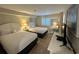 Cozy bedroom featuring two queen-sized beds and comfortable furnishings at 601 Retreat Beach Circle # 521, Pawleys Island, SC 29585