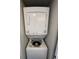 Close-up of a GE stacked washer and dryer unit at 601 Retreat Beach Circle # 521, Pawleys Island, SC 29585