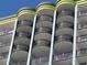 Close up of the curved private balconies, providing outdoor space, of this modern-style building at 6804 N Ocean Blvd. # 1023, Myrtle Beach, SC 29572