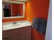 Well-lit bathroom with a modern vanity, a large mirror, and a clean, minimalist design at 6804 N Ocean Blvd. # 1023, Myrtle Beach, SC 29572