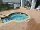 Inviting 3-foot-deep hot tub with clear blue water and easy access, surrounded by brick paving and greenery at 6804 N Ocean Blvd. # 1023, Myrtle Beach, SC 29572