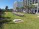 Expansive lawn area with comfortable lounge chairs and fun outdoor games to enjoy at 6804 N Ocean Blvd. # 1023, Myrtle Beach, SC 29572