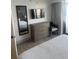 Bright bedroom with a full-length mirror and modern dresser with drawers at 7100 North Ocean Blvd. # 617, Myrtle Beach, SC 29577