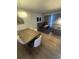 Open-concept dining area next to a cozy living room, with hardwood floors and contemporary decor at 7100 North Ocean Blvd. # 617, Myrtle Beach, SC 29577