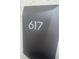 Modern house number '617' sign with braille on a dark, textured background at 7100 North Ocean Blvd. # 617, Myrtle Beach, SC 29577
