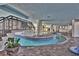 Indoor pool with bridge and water play area at 7100 North Ocean Blvd. # 617, Myrtle Beach, SC 29577