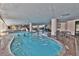 Indoor pool with brick trim, columns, and seating area at 7100 North Ocean Blvd. # 617, Myrtle Beach, SC 29577