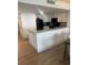 Bright kitchen featuring white cabinetry, modern appliances, and a breakfast bar at 7100 North Ocean Blvd. # 617, Myrtle Beach, SC 29577