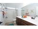 Bathroom showcasing double sink vanity, framed mirror, and shower over tub at 7180 Shooting Star Way, Myrtle Beach, SC 29579