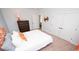 Bedroom features neutral carpet, grey walls, and white closets at 7180 Shooting Star Way, Myrtle Beach, SC 29579