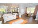 Bright kitchen with an island and stainless steel appliances, seamlessly connected to the dining area at 7180 Shooting Star Way, Myrtle Beach, SC 29579