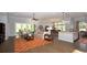 Spacious living area featuring a view of the dining area and kitchen, with sliding glass door to the outside at 7180 Shooting Star Way, Myrtle Beach, SC 29579