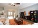 Inviting living room with an open floor plan, and seamless flow to the kitchen area at 7180 Shooting Star Way, Myrtle Beach, SC 29579