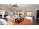 Inviting living room with an open floor plan, and seamless flow to the kitchen area at 7180 Shooting Star Way, Myrtle Beach, SC 29579