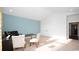Bright office space features neutral carpet, blue accent wall, and double door closet at 7180 Shooting Star Way, Myrtle Beach, SC 29579
