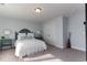 Tranquil bedroom featuring blue walls, plush carpeting, and calming decor, creating a restful atmosphere at 760 Choctaw Dr., Conway, SC 29526