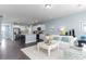 Open-concept living space featuring a modern kitchen with island and comfortable living area at 760 Choctaw Dr., Conway, SC 29526
